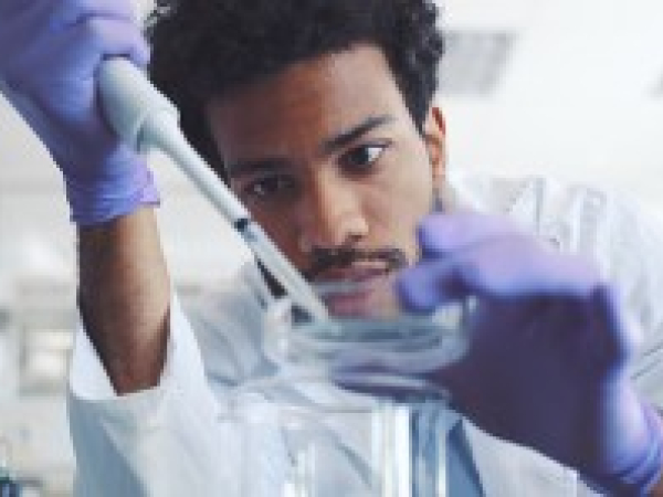 Student completing a science experiement 